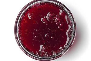 Vibrant Red Jelly in Glass Jar for Culinary and Design Use photo
