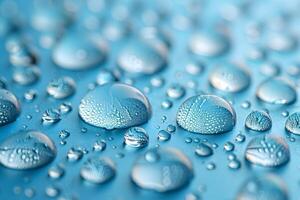 Gleaming Water Droplets on Blue Background for Nature and Design Concepts photo