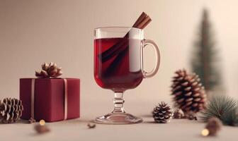 A glass of red liquid with cinnamon sticks in it sits on a table next to a red b photo