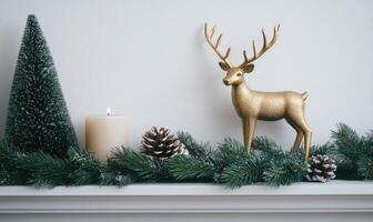 A gold deer is standing on a mantle next to a candle and pine cones photo