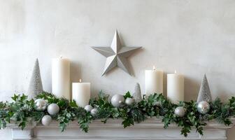 A star is hanging on the wall above a mantle with candles and greenery photo
