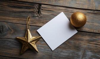 A gold star sits on a wooden surface next to a white card photo