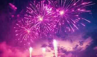 A fireworks display with three large fireworks in the sky photo