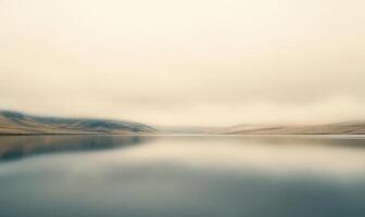 A cloudy sky with a lake in the background photo
