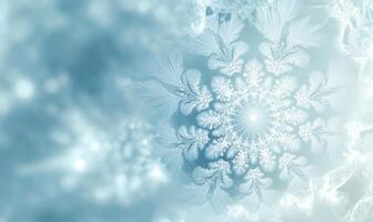 A snowflake is the main focus of the image, with a blue background photo