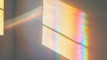 Overlay effect for photo and mockups. Organic drop diagonal shadow and ray of light with rainbow from window on a white wall.