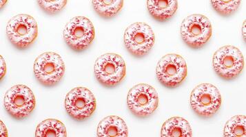 Flat lay donuts pattern isolated on a white background. Top view photo