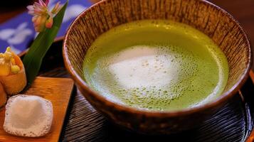 Japanese matcha green tea in a bowl photo