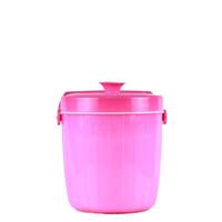 Pink rice bucket isolated on a white background. With clipping path. photo