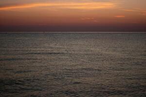 Sunset Over the Ocean with Beautiful View photo