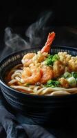 Japanese udon noodle soup with shrimps on table photo