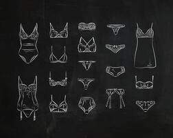 Set of classic underwear icons in vintage style drawing with chalk on chalkboard vector