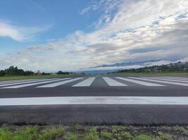 airplane runway and clear blue sky photo