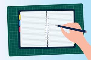 Hand holding pencil and writing on the notebook flat design vector