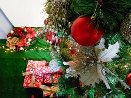 Top view for christmas tree and close up to the decoration on it photo