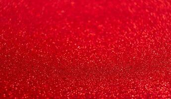 Red festive Christmas background. Abstract shimmering bright background with bokeh defocused photo