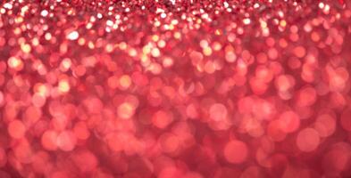 Out of focus red bokeh. Festive background for christmas, new year, wedding. photo