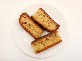 Cakes with chocolate on a white background. A cake for tea. photo