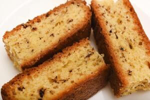 Cakes with chocolate on a white background. A cake for tea. photo