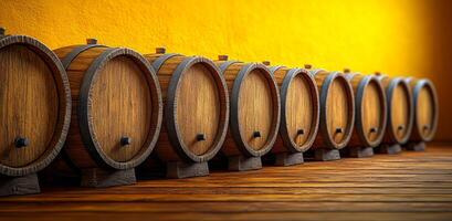 A row of wooden barrels are lined up on a wooden floor. The barrels are all the same size and shape, and they are all brown. The scene gives off a rustic and traditional vibe photo