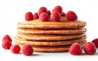A stack of pancakes with raspberries on top. The pancakes are piled high and the raspberries are scattered around them. Concept of indulgence and comfort photo