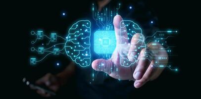 Businessman interact with AI artificial intelligence brain processor in concept of AI artificial intelligence engineering, big data and AI machine learning to use for business support. photo