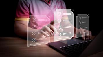 Businessman check electronic documents on digital documents and checklist approve, online evaluation of business on virtual interface, Communication technology concept. photo