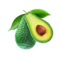 green fresh whole and half cut avocado with leaf side view isolated on white background photo