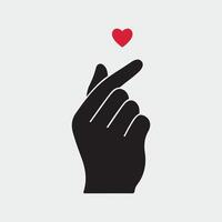 A hand with a red heart on it vector