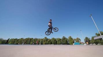 A man is doing a trick on a bike video