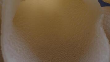 A close up of a white object with a hole in it video