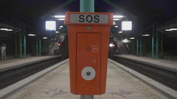 SOS emergency call box at public transportation station in Germany. SOS Notrufsaeule Hilfe an Haltestelle Stadtbahn in Stuttgart, Deutschland. Emergency telephone. Notruf im Bahnhof. SOS Call Station. video