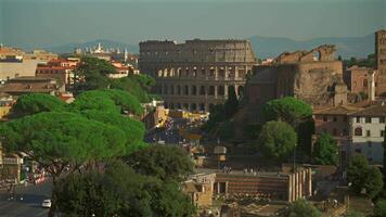 Overhead view of Rome city and coliseum from observation deck Atrio della liberta. Rome skyline and Colosseum from viewing point Piazza Venezia. Top view of Rome city with Colosseum and Roman Forum. video