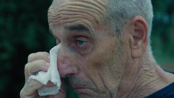 Abandoned Elderly Man Wipes His Tears On His Handkerchief After Crying Outdoors video