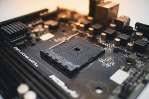 Black Motherboard CPU Socket with Components, Circuit Board Close up. photo