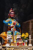 Buddhist temple with asian statues inside Huyen Khong Cave in Marble Mountains in Da Nang in Vietnam in Asia photo