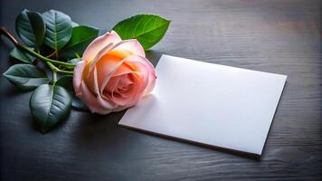 Clean smooth white card, top view, dark smooth tabletop, soft ambient light, one fresh rose flower photo