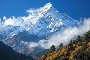 Ama dablam dominating the landscape with colorful autumn trees in the himalayas photo