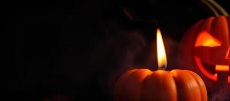 Lit Pumpkin With Smoke And A Jack O Lantern In The Background photo