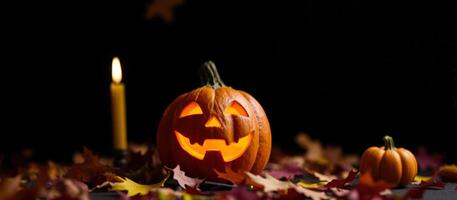 Illuminated Jack-O'-Lantern with Candlelight and Autumn Leaves photo