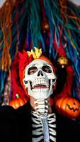 Smiling Skeleton in Dia de los Muertos Costume photo