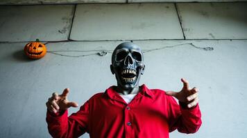 Man In A Skull Mask Reaches Out photo