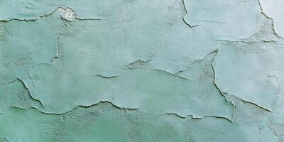 Close-up of a vintage olive-green plaster wall showcasing intricate textures and subtle imperfections photo