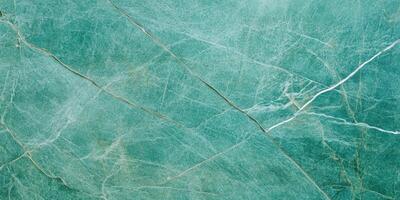 Smooth sage green stone background with subtle grain for calming natural aesthetics photo