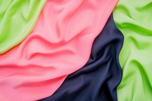 Abstract composition featuring draped pink fabric with smooth gradients of dark navy blue and light green photo