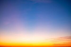Beautiful , luxury soft gradient orange gold clouds and sunlight on the blue sky perfect for the background, take in everning,Twilight, Large size, high definition landscape photo