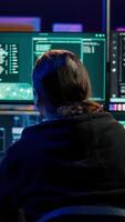 Vertical Rogue computer scientist uses AI machine learning to develop zero day exploit undetectable by antivirus. Hacker uses artificial intelligence neural networks to build script tricking firewall, camera B video