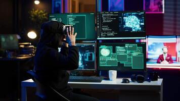 Hacker using virtual reality headset to code malware exploiting network backdoors, bypassing security measures such as logins and password protections using futuristic VR goggles tech, camera A video