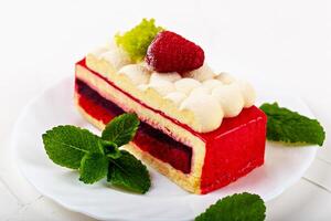 Cake with raspberry berries and mint leaves photo