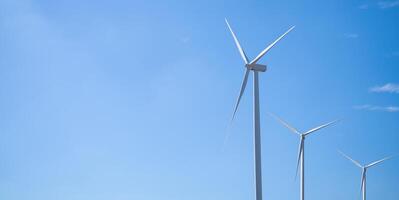 Wind energy and sustainable power generation with wind turbines, Eco-friendly solutions for renewable resources. Wind power farm and sustainable development of renewable energy, green technology. photo